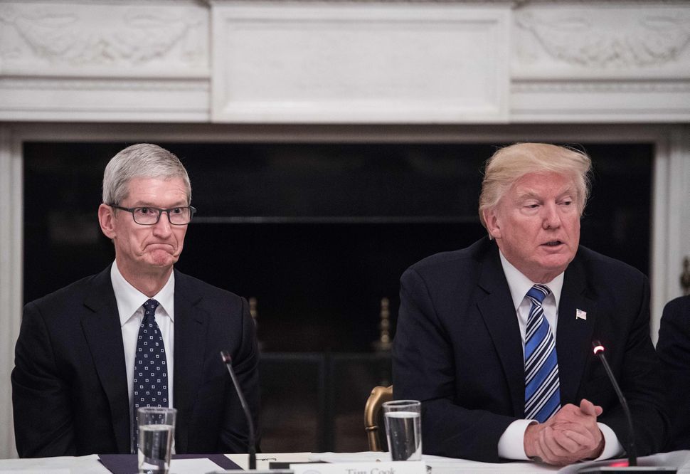 Apple CEO Tim Cook and US President Donald Trump